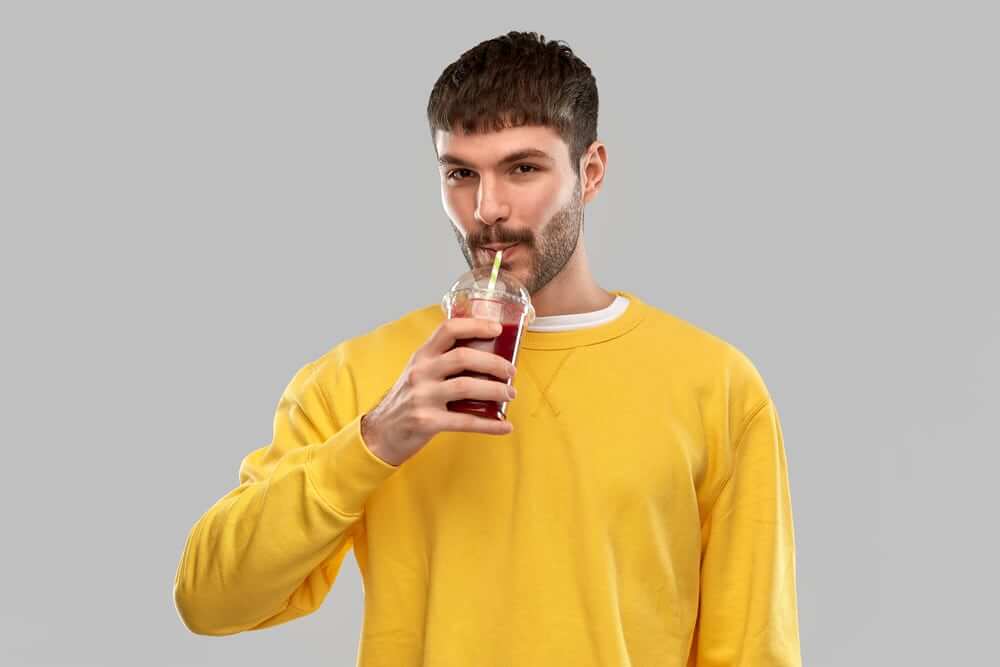 Man Drinks Juice